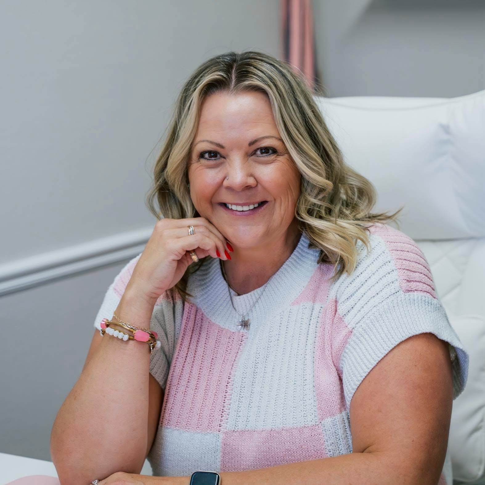 A professional photo of Lisa, the esthetician.